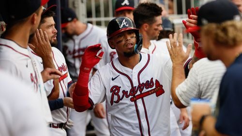 Atlanta Braves shortstop Orlando Arcia (11) celebrates with teammates after hitting a solo home run during the third inning against the Miami Marlins at Truist Park on Thursday, August 1, 2024, in Atlanta. 

(Miguel Martinez/ AJC)