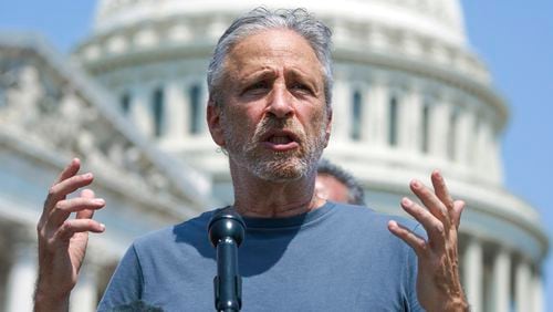 FILE - Entertainer and activist Jon Stewart speaks at the Capitol in Washington, May 26, 2021. Stewart is pressing the Biden administration to fix a loophole in a massive veterans aid bill that has left out some of the very first troops who responded after the Sept. 11 attacks. They got sick from staying at at Karshi-Khanabad, Uzbekistan, or K2, a base contaminated with enriched uranium. (AP Photo/J. Scott Applewhite, File)