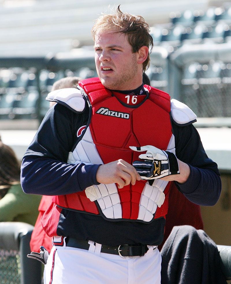 Atlanta Braves catcher Brian McCann has a laugh while suiting up for a  workout during spring training baseball in Kissimmee, Fla., Saturday, Feb.  19, 2011. (AP Photo/Phelan M. Ebenhack Stock Photo - Alamy