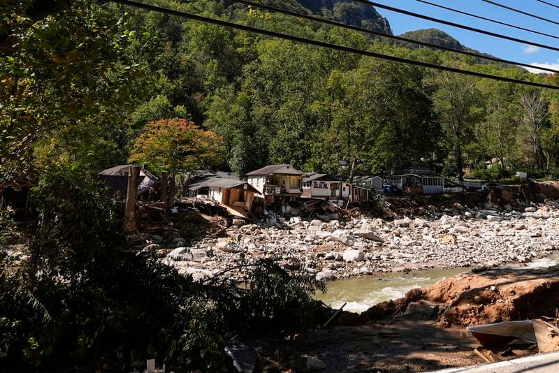 Homes are seen in the aftermath of Hurricane Helene, Wednesday, Oct. 2, 2024, in Chimney Rock Village, N.C. (AP Photo/Mike Stewart)