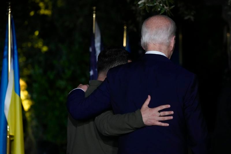 President Joe Biden and Ukrainian President Volodymyr Zelenskyy, left, leave after signing a bilateral security agreement on the sidelines of the G7, Thursday, June 13, 2024, in Savelletri, Italy. (AP Photo/Alex Brandon)