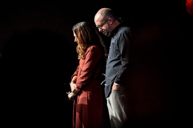 Lead Pastor Jason Britt and is wife Nan Britt pray during a Sunday service at Bethlehem Church, Sunday, Sept. 8, 2024, in Bethlehem, Ga. Colt Gray, 14, has been charged with murder over the killing of two students and two teachers at Apalachee High School in Barrow County, outside Atlanta, on Wednesday. (AP Photo/Mike Stewart)