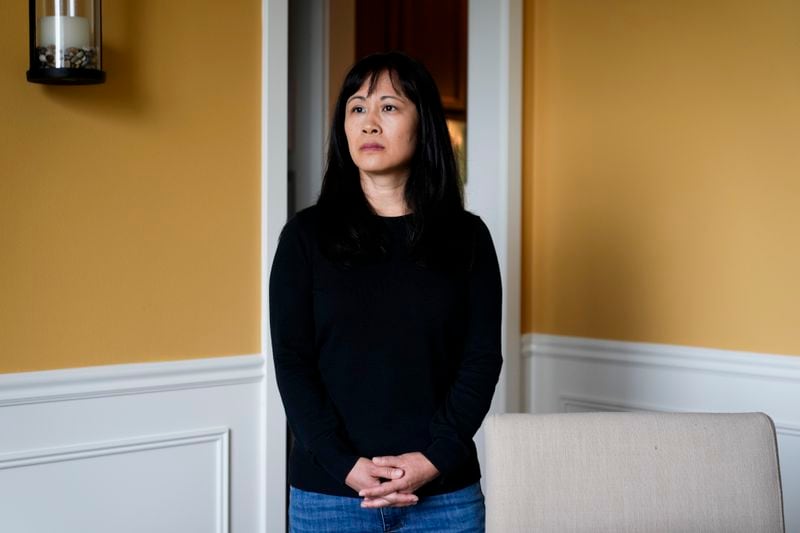 Ellen Lo Hoffman, the co-founder of Soul Reparations, a nonprofit providing free spiritual support to women, poses for a portrait at her home Wednesday, Aug. 21, 2024, in Bothell, Wash. (AP Photo/Lindsey Wasson)