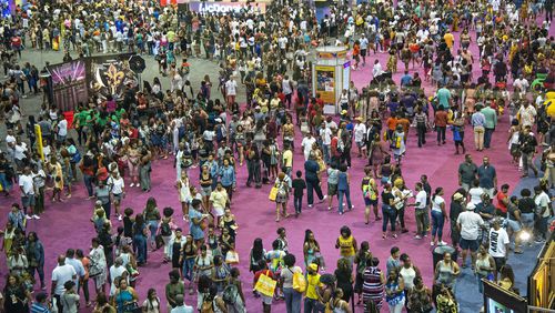 FILE - Attendees walk around the 2018 Essence Festival at the Ernest N. Morial Convention Center on Friday, July 6, 2018, in New Orleans. The 30th Essence Festival of Culture, celebrating the best of Black culture’s policymakers, thought leaders, creatives, business minds, health experts and musical talent, will take place this Fourth of July weekend, 2024, in New Orleans. (Photo by Amy Harris/Invision/AP, File)