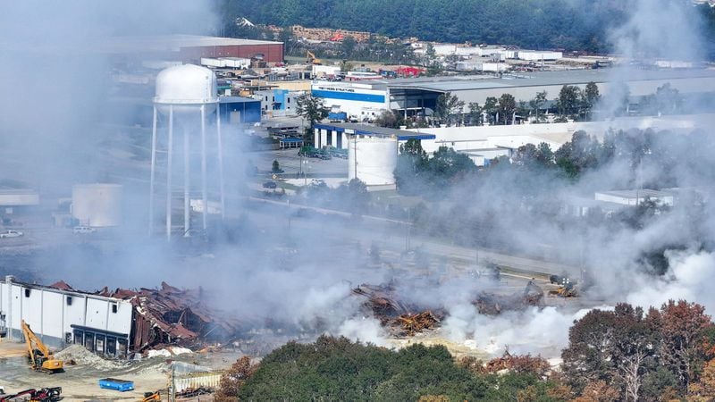 This aerial view, taken on the side of I-20, shows smoke traveling west from the Biolab facility in Conyers on Thursday, October 3, 2024. Atlanta Mayor Andre Dickens advised city residents to take precautions and reduce outdoor activities until noon on Thursday. He warned that smoke from a recently extinguished chemical plant fire in Rockdale County could drift westward.
(Miguel Martinez / AJC)