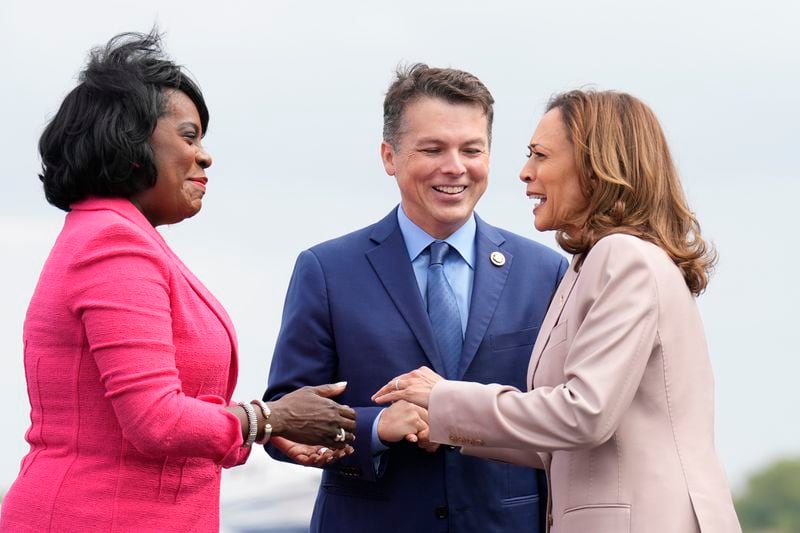 Democratic presidential nominee Vice President Kamala Harris, right, is greeted by Philadelphia Mayor Cherelle Lesley Parker, left, and Rep. Brendan Boyle, D-PA., center, on the tarmac at Atlantic Aviation Philadelphia, Monday, Sept. 9, 2024, near Philadelphia International Airport, in Philadelphia, Tuesday, Sept. 17, 2024. (AP Photo/Jacquelyn Martin)