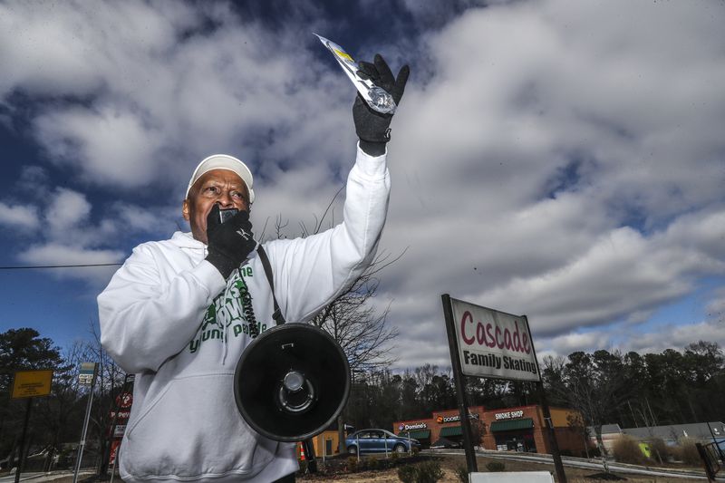 Jack Logan, founder of Put Down the Guns Now Young People Organization from Greenville, South Carolina, stands in front of the parking lot of Cascade Family Skating on Martin Luther King Jr. Drive, where a 13-year-old was shot to death over the weekend. 

