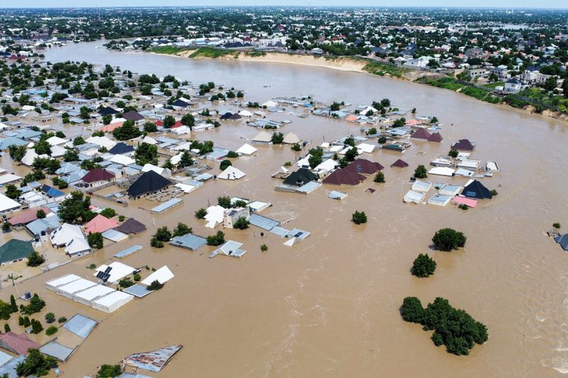 Houses are partially submerged following a dam collapse in Maiduguri, Nigeria, Tuesday, Sept 10, 2024. (AP Photos/ Musa Ajit Borno)