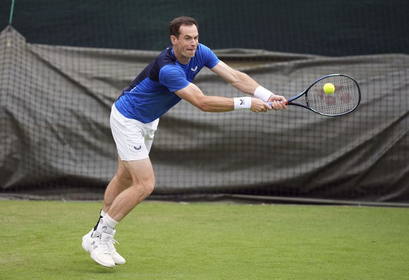 Andy Murray plays a shot during a training session on day two of the 2024 Wimbledon Championships at the All England Lawn Tennis and Croquet Club, London, Tuesday July 2, 2024. (Jordan Pettitt/PA via AP)