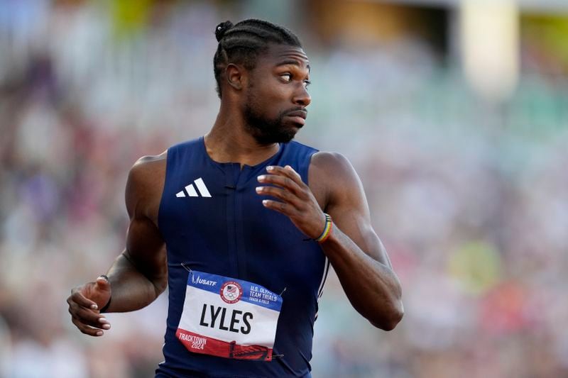 Noah Lyles wins a heat men's 200-meter semi-finals during the U.S. Track and Field Olympic Team Trials Friday, June 28, 2024, in Eugene, Ore. (AP Photo/George Walker IV)