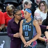 Atlanta Dream coach Tanisha Wright instructs guard Allisha Gray (15) during the first half at the Gateway Center Arena, Friday, July 12, 2024, in College Park. (Hyosub Shin / AJC)