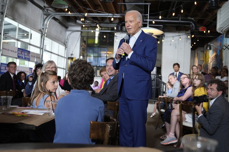 President Joe Biden speaks to supporters at Garage Grill & Fuel Bar during a campaign stop in Northville, Mich., Friday July 12, 2024. (AP Photo/Jacquelyn Martin)