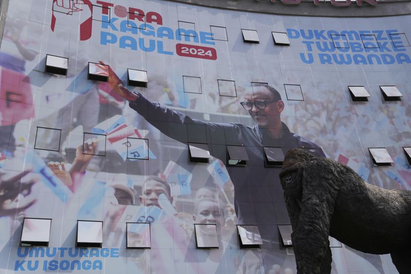 A campaign poster of Rwandan President and presidential candidate Paul Kagame on a building in Kigali, Rwanda, Thursday, July 11, 2024. Rwandans are voting Monday in an election that will almost certainly extend the long rule of Kagame, who is running virtually unopposed after three decades in power in the eastern African nation. (AP Photo/Brian Inganga)
