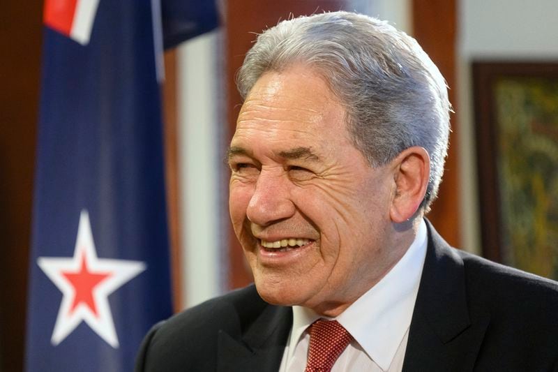 New Zealand Foreign Minister Winston Peters smiles during an interview with The Associated Press in his parliamentary office in the capital, Wellington, Thursday, Aug. 22, 2024. (AP Photo/Mark Tantrum)