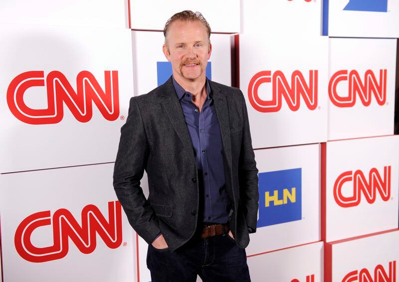 FILE - Morgan Spurlock of the CNN series "Inside Man" poses at the CNN Worldwide All-Star Party, on Friday, Jan. 10, 2014, in Pasadena, Calif. Spurlock, an Oscar-nominee who made food and American diets his life’s work, famously eating only at McDonald’s for a month to illustrate the dangers of a fast-food diet, has died. He was 53. (Photo by Chris Pizzello/Invision/AP, File)