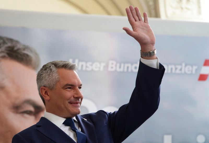 Austrian Chancellor Karl Nehammer of the People's Party attends his final election rally in Vienna, Austria, Friday, Sept. 27, 2024. (AP Photo/Heinz-Peter Bader)