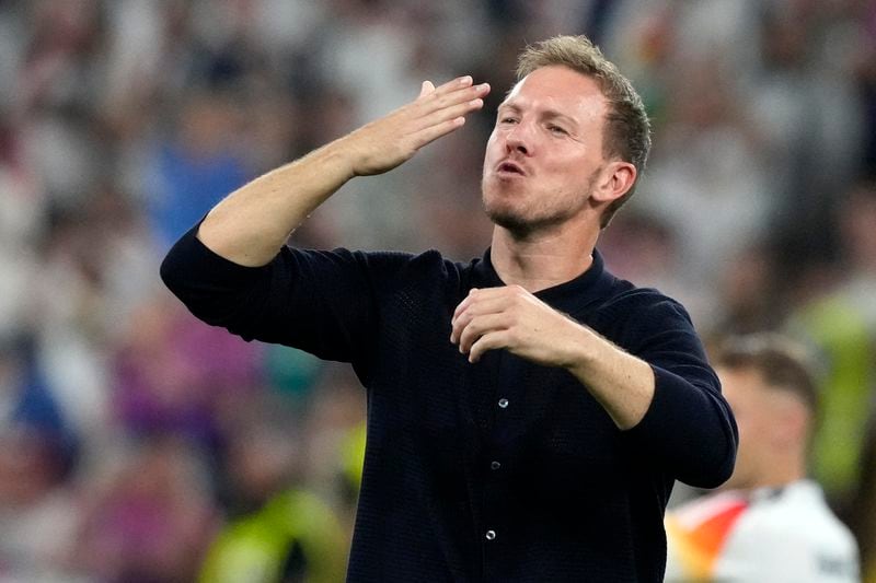 Germany's head coach Julian Nagelsmann waves to the fans after a round of sixteen match between Germany and Denmark at the Euro 2024 soccer tournament in Dortmund, Germany, Saturday, June 29, 2024. Germany won 2-0. (AP Photo/Frank Augstein)