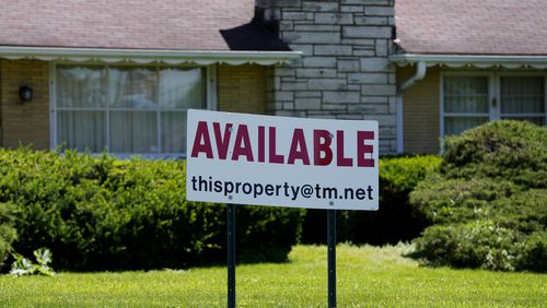 FILE - A sign announcing the availability of a home is displayed in Rolling Meadows, Ill., June 10, 2024. On Tuesday, July 23, 2024, the National Association of Realtors reports on existing home sales for June. (AP Photo/Nam Y. Huh, File)