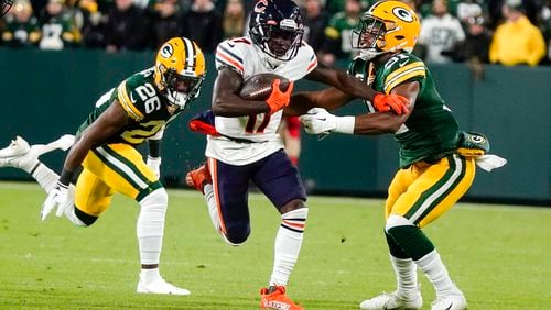 FILE - Chicago Bears' Jakeem Grant gets past Green Bay Packers' Darnell Savage and Adrian Amos for a touchdown reception during the first half of an NFL football game Sunday, Dec. 12, 2021, in Green Bay, Wis. While awaiting word from Deshaun Watson, the Browns addressed needs by agreeing Wednesday, March 16, 2022, to terms on contracts with free agent linebacker Anthony Walker Jr. and Pro Bowl returner Jakeem Grant, a person familiar with the deals told The Associated Press. (AP Photo/Morry Gash, File)