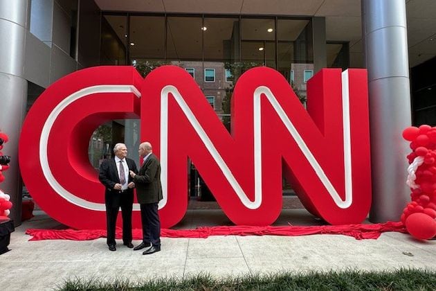 On Sept. 24, 2024, CNN CEO Mark Thompson meets with former CNN president Tom Johnson at the Midtown Turner campus in Atlanta for the unveiling of the CNN logo previously at CNN Center for more than 25 years. CONTRIBUTED