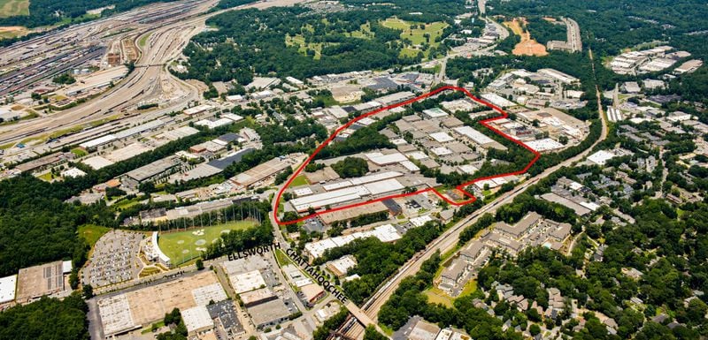 An aerial view of the 80-acre site that encompasses the planned Works at Chattahoochee project in northwest Atlanta. This view, looking northwest, shows the Top Golf complex to the south of the property. Selig Development plans to transform aging warehouses into a blend of offices, apartments, retail, restaurants and green space. SPECIAL