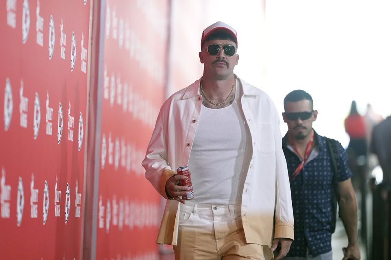 Kansas City Chiefs tight end Travis Kelce arrives before the start of an NFL football game between the Kansas City Chiefs and the Baltimore Ravens Thursday, Sept. 5, 2024, in Kansas City, Mo. (AP Photo/Charlie Riedel)