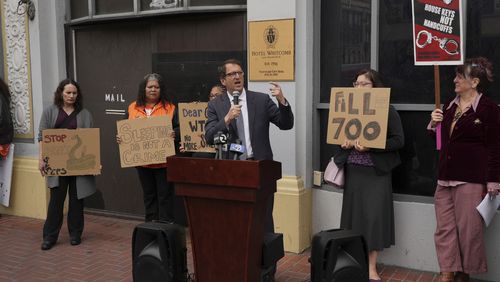 San Francisco Supervisor Dean Preston speaks at a news conference opposing Mayor London Breed's crackdown on homeless encampments in San Francisco on Tuesday, July 30, 2024. Police will start clearing out homeless residents who have refused to move from public areas under new policies. (AP Photo/Terry Chea)