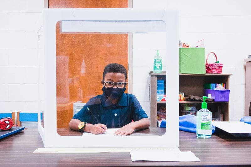 Marietta City Schools installed partitions on student desks as part of its efforts to help stop the spread of the coronavirus.