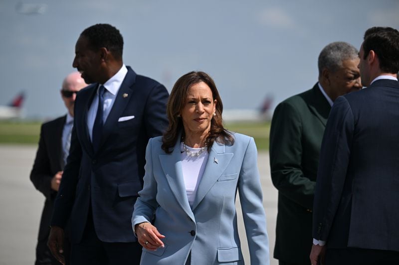 Vice President Kamala Harris arrives for a rally at the Georgia State University’s convocation center in Atlanta on Tuesday, July 30, 2024. Behind her is Atlantaa Mayor Andre Dickens, Sen. Jon Ossoff and Fulton Board of Commissioners Chairman Robb Pitts.  It is her first campaign event in Georgia since she became the presumptive Democratic nominee.  (Hyosub Shin / Hyosub.Shin / ajc.com)