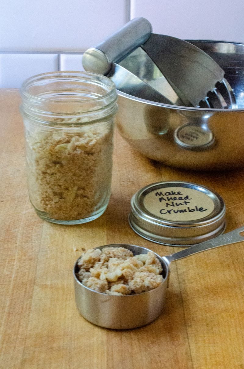 Make-Ahead Nut Crumble has uses beyond peach tartlets. (Virginia Willis for The Atlanta Journal-Constitution)
