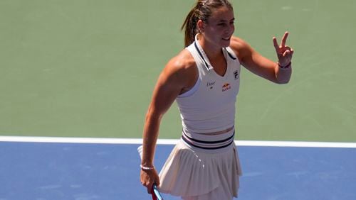 Emma Navarro, of the United States, reacts after defeating Paula Badosa, of Spain, during the quarterfinals of the U.S. Open tennis championships, Tuesday, Sept. 3, 2024, in New York. (AP Photo/Kirsty Wigglesworth)