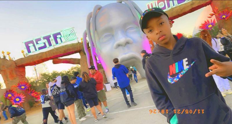 FILE - This photo provided by Taylor Blount shows Ezra Blount, 9, posing outside the Astroworld music festival in Houston, Nov. 5, 2021. Ezra is the youngest person to die from injuries sustained during a crowd surge at the Astroworld music festival. The one remaining wrongful death lawsuit filed by the family of Ezra after 10 people were killed during a deadly crowd crush at the 2021 Astroworld music festival has been settled, an attorney said Thursday, May 23, 2024. (Taylor Blount via AP, File)