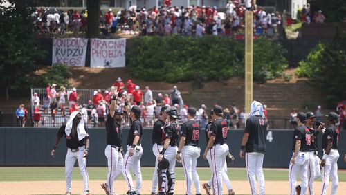 Georgia players celebrate their 11-2 win against N.C. State in Game 2 of the NCAA Super Regional at Foley Field, Sunday, June 9, 2024, in Athens, Ga. Georgia won 11-2 to force a deciding Game 3. (Jason Getz / AJC)
