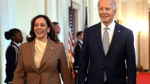 FILE - Vice President Kamala Harris, left, and President Joe Biden arrive for an event in the East Room of the White House, May 9, 2024, in Washington. She's already broken barriers, and now Harris could soon become the first Black woman to head a major party's presidential ticket after President Joe Biden's ended his reelection bid. The 59-year-old Harris was endorsed by Biden on Sunday, July 21, after he stepped aside amid widespread concerns about the viability of his candidacy. (AP Photo/Evan Vucci, File)