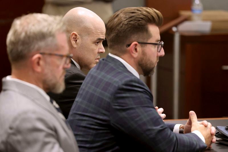 Robert Telles, center, waits in the courtroom for the verdict in his murder trial at the Regional Justice Center in Las Vegas Wednesday, August 28, 2024. Telles, a former Clark County public administrator, was found guilty in the stabbing death of Las Vegas Review-Journal investigative journalist Jeff German. With Telles are his attorneys Robert Draskovich, left, and Michael Horvath. (K.M. Cannon/Las Vegas Review-Journal via AP, Pool)