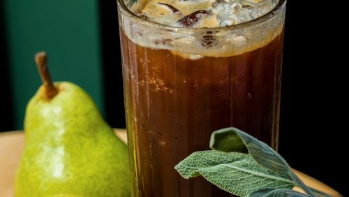 Spiller Park's pear sage espresso tonic, also known as PSWLU (Pear Sage We Love You), includes pear puree, sage syrup, lemon, seltzer water and espresso. Courtesy of Gloria McDuff/Spiller Park