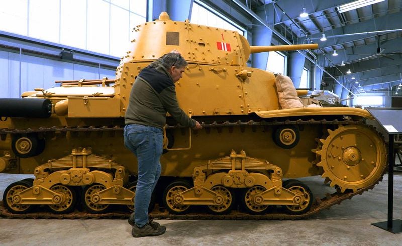 Robert Barlow, museum specialist and restoration shop manager with the U.S. Army Armor and Cavalry Collection at Ft. Moore, Georgia, talks about the restoration of this M 14/41 Italian tank, also called the Carro Armato M 14/41. (Courtesy of Mike Haskey)
