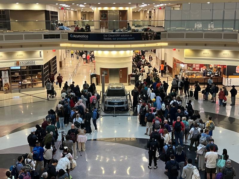 A near-record number of people passed through security checkpoints at Hartsfield-Jackson International Airport on Friday, May 10, 2024. Kelly Yamanouchi / kelly.yamanouchi@ajc.com