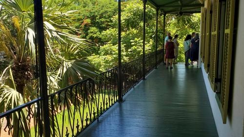 A second-floor balcony at the Hemingway Home & Museum in Key West, Florida, on Wednesday, July 17, 2024. Ernest Hemingway and his then-wife, Pauline, bought the home in 1931. It was turned into a museum in 1964. (AP Photo/David Fischer)