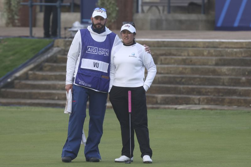 Lilia Vu, of the United States, reacts after button on the 18th green during the final round of the Women's British Open golf championship, in St. Andrews, Scotland, Sunday, Aug. 25, 2024, Vu finished second behind Lydia Ko of New Zealand. (AP Photo/Scott Heppell)