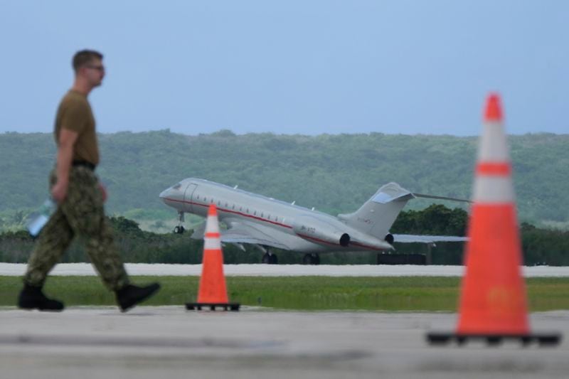 A plane carrying WikiLeaks founder Julian Assange takes off from Saipan, Mariana Islands, Wednesday, June 26 2024. (AP Photo/Eugene Hoshiko)
