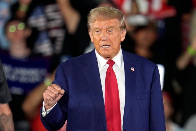 Republican presidential nominee former President Donald Trump arrives for a town hall event at Macomb Community College Friday, Sept. 27, 2024, in Warren, Mich. (AP Photo/Paul Sancya)