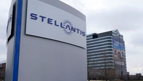 FILE - The Stellantis sign is seen outside the Chrysler Technology Center, July 19, 2021, in Auburn Hills, Mich. Jeep and Ram maker Stellantis says it will offer buyout packages to many of its U.S. white-collar workers just five days after the company's CEO said the auto industry is in the middle of a significant storm. (AP Photo/Carlos Osorio, File)
