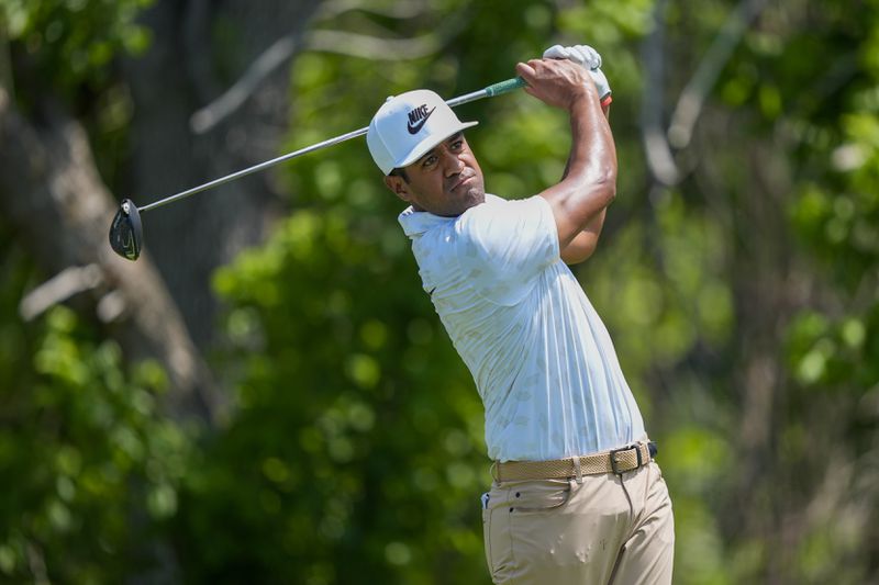 Tony Finau tees off the sixth hole during the first round of the Charles Schwab Challenge golf tournament at Colonial Country Club, Thursday, May 23, 2024, in Fort Worth, Texas. (AP Photo/LM Otero)