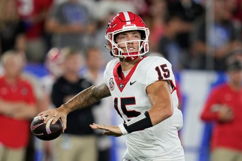 Georgia quarterback Carson Beck throws during the first half of an NCAA college football game against Kentucky, Saturday, Sept. 14, 2024, in Lexington, Ky. (AP Photo/Darron Cummings)