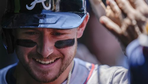 Atlanta Braves' Jarred Kelenic celebrates after hitting a home run during the fifth inning of a baseball game against the Chicago Cubs, Thursday, May 23, 2024, in Chicago. (AP Photo/Erin Hooley)