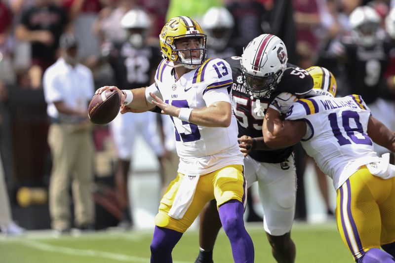 LSU quarterback Garrett Nussmeier (13) looks to pass during the first half of an NCAA college football game against South Carolina Saturday, Sept. 14, 2024 in Columbia, S.C. (AP Photo/Artie Walker Jr.)