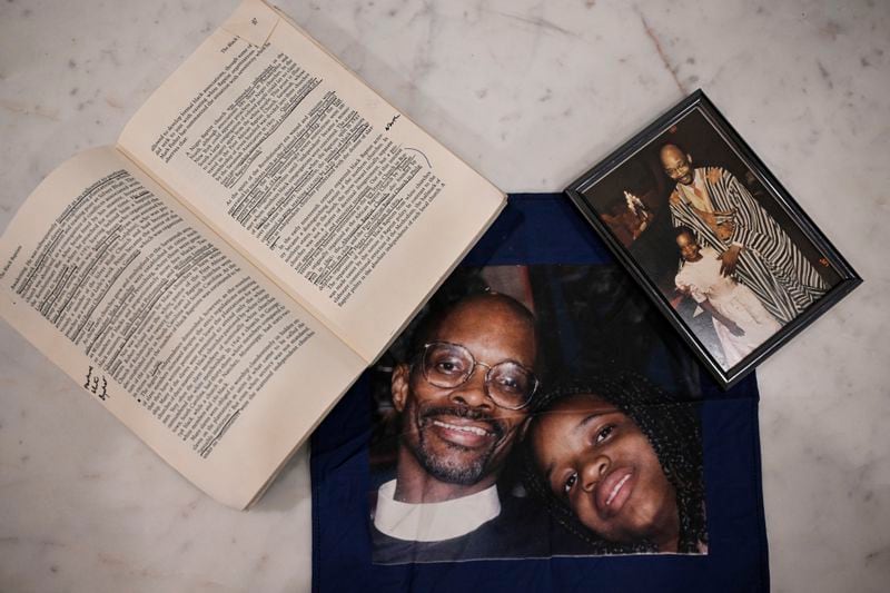 Momentos and images of Ferguson activist Brittany Packnett-Cunningham and her father Rev. Ronald Packnett are seen, Saturday, Sep. 7, 2024, in Mount Rainier, Md. (AP Photo/Terrance Williams)