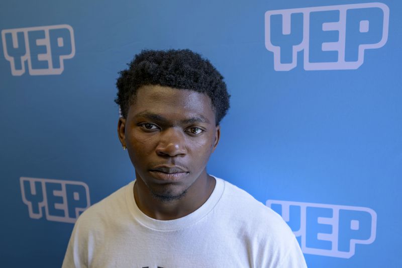 Ke'Daryl Sentmore, 17, is a participant in the Youth Empowerment Project (YEP) works program and attended a graduation of fellow students in New Orleans, Thursday, June 27, 2024. (AP Photo/Matthew Hinton)