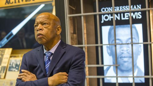 U.S. Congressman John Lewis (D-GA) poses for a portrait in front of his newly unveiled art exhibit "John Lewis-Good Trouble" in the atrium of the domestic terminal at Atlanta's Hartsfield Jackson International Airport, on April 8, 2019. (Alyssa Pointer/Atlanta Journal-Constitution/TNS)